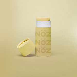 Nöz reef safe SPF sunscreen in green.